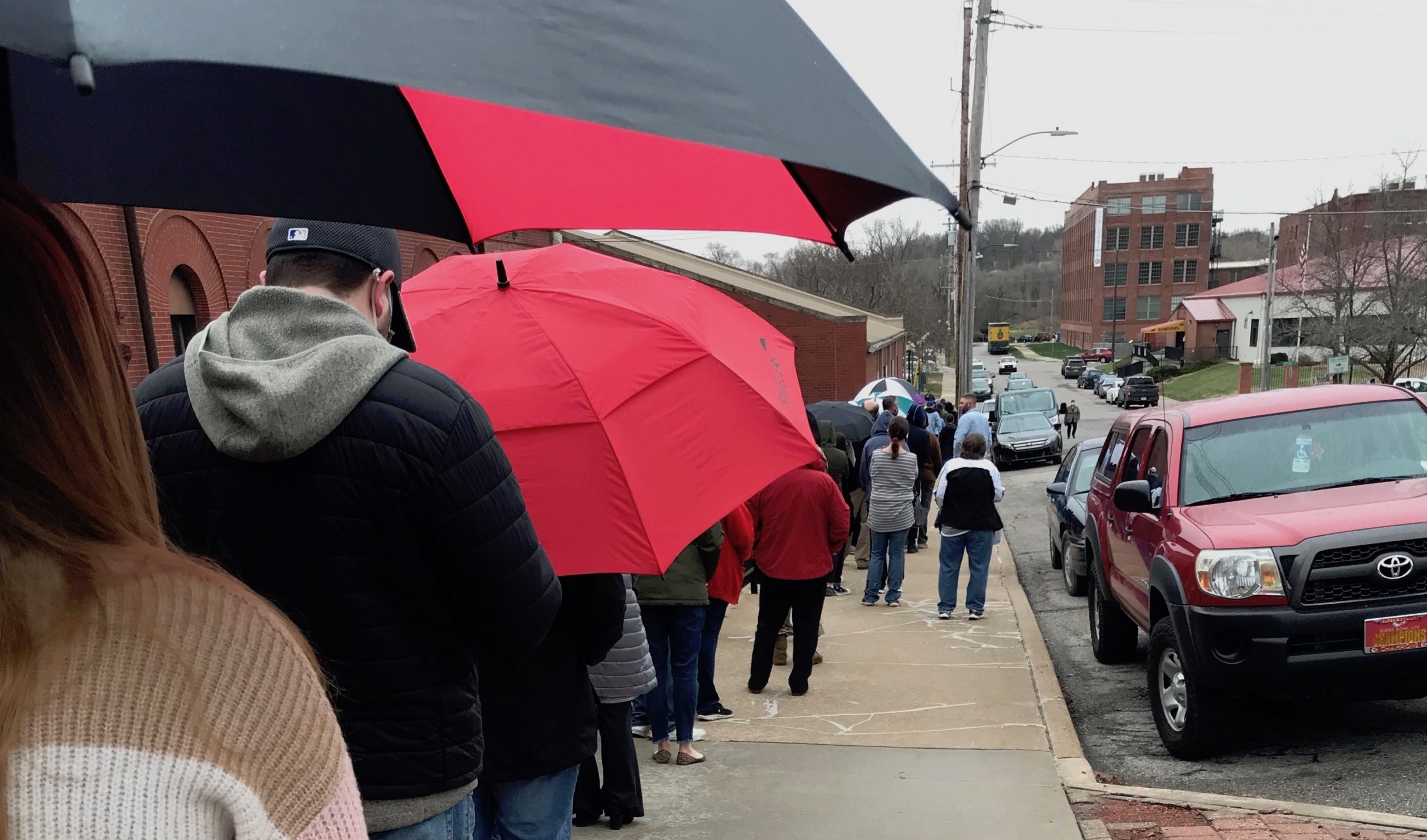 People waiting in line to receive vaccine.